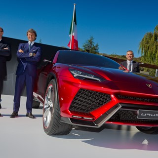 Filippo Perini, Stephan Winkelmann and Maurizio Reggiani next to Lamborghini Urus at Monterey (CA), US.