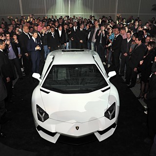 President and CEO of Automobili Lamborghini, Stephan Winkelmann, presents Aventador LP 700-4 to media and customers