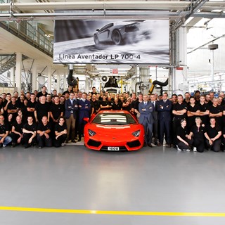 Aventador line workers and memebers of Automobili Lamborghini Board celebrating Aventador no. 1.000