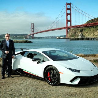 Stefano Domenicali with the Huracán Performante at the Golden Gate Bridge