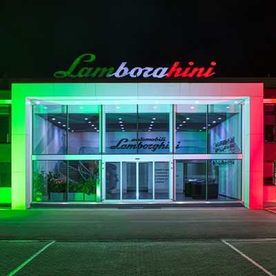 Lamborghini historical entrance with Italian Tricolore lights